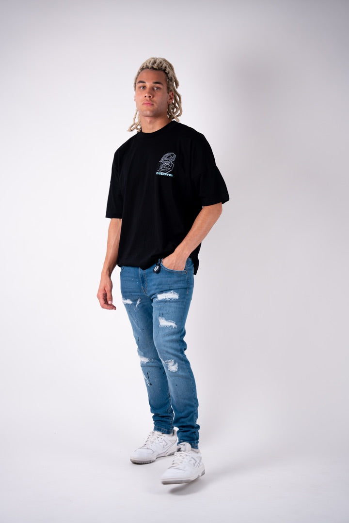 Blue Noir splatter slim jeans