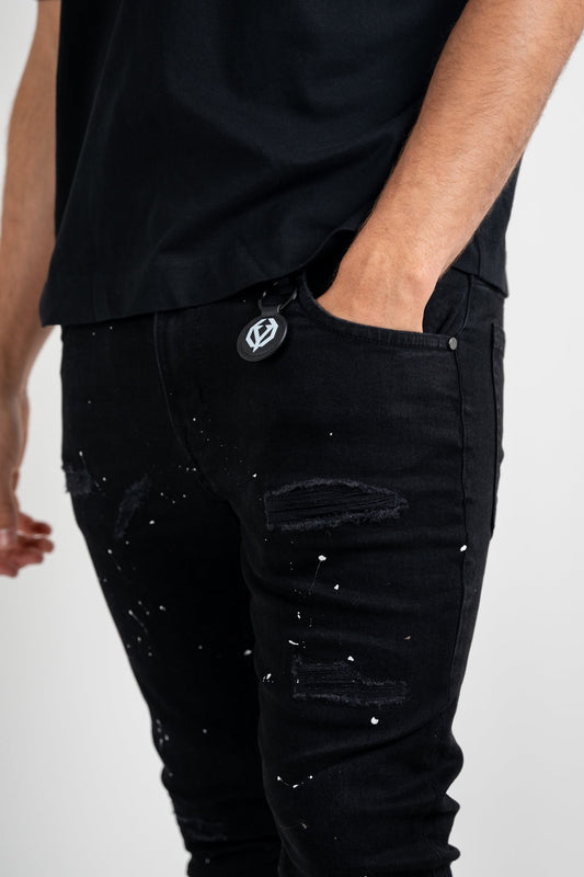 Black Ice splatter slim jeans